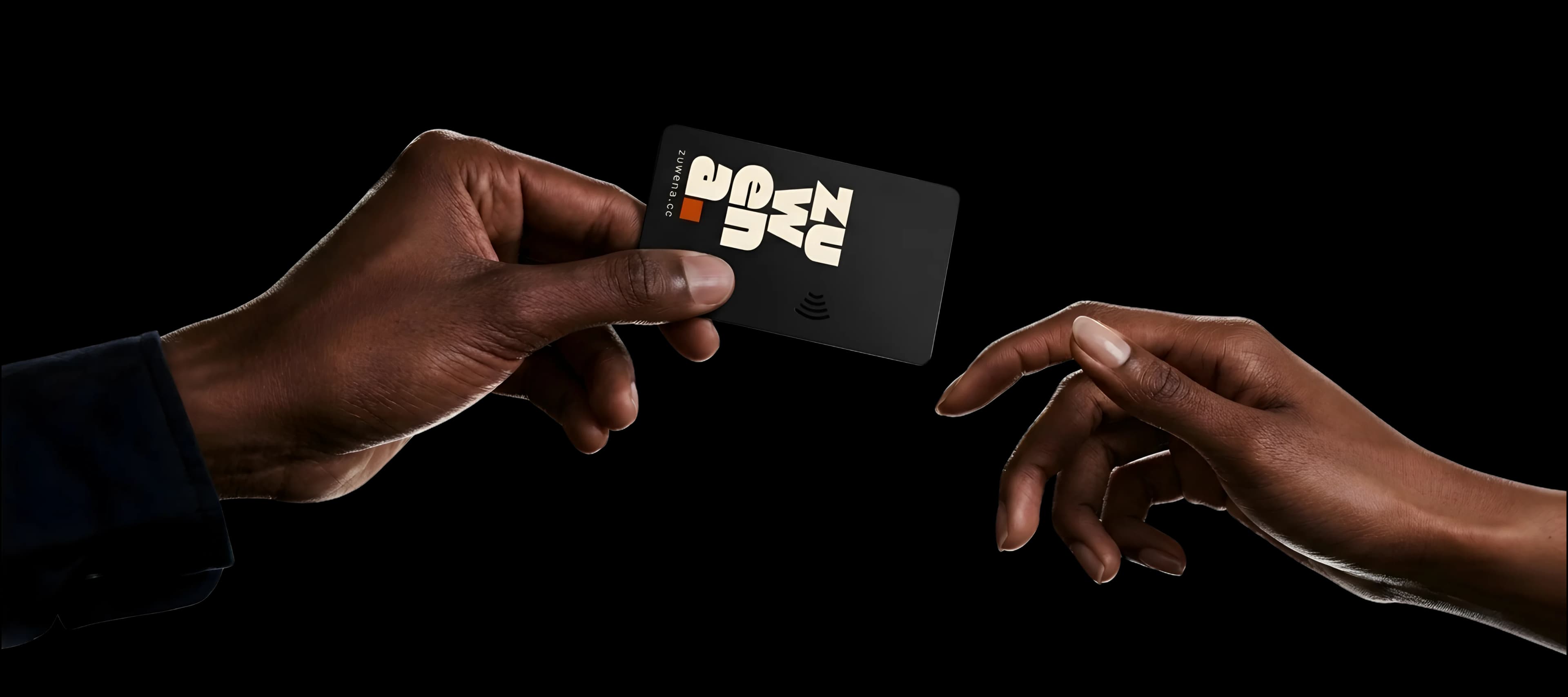 A Zuwena NFC card being handed from one person to another